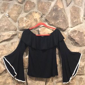 Off-the-shoulder black top with bell sleeves